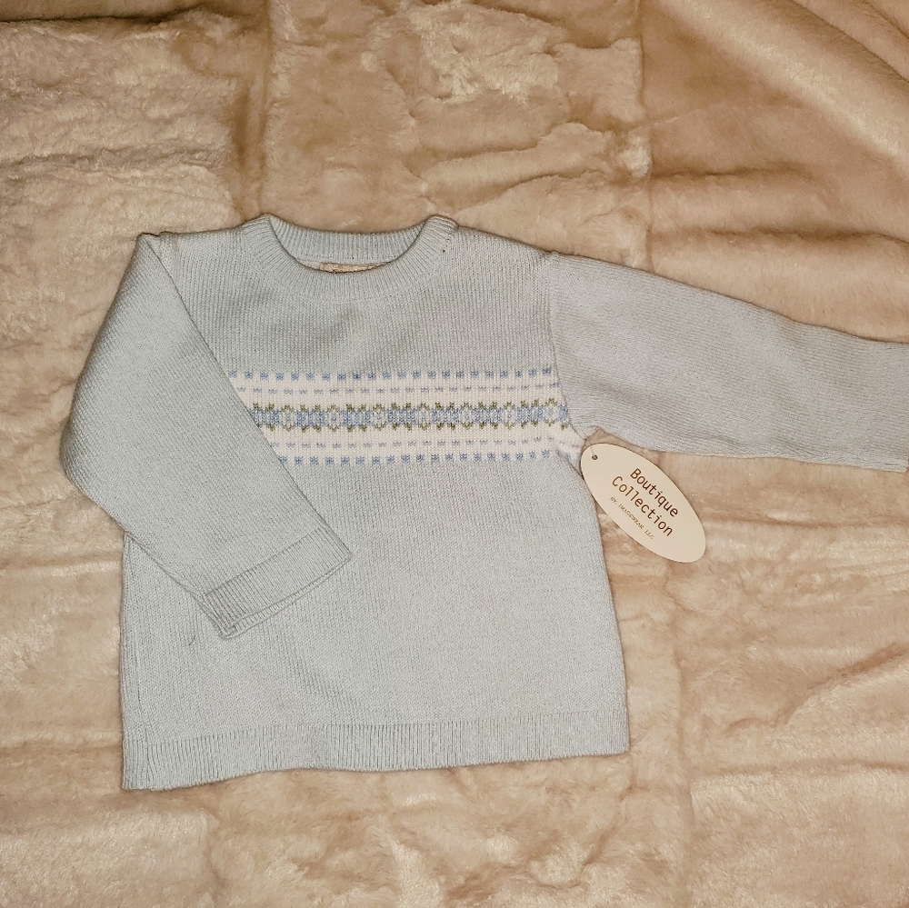 Child's light blue sweater,  NWT